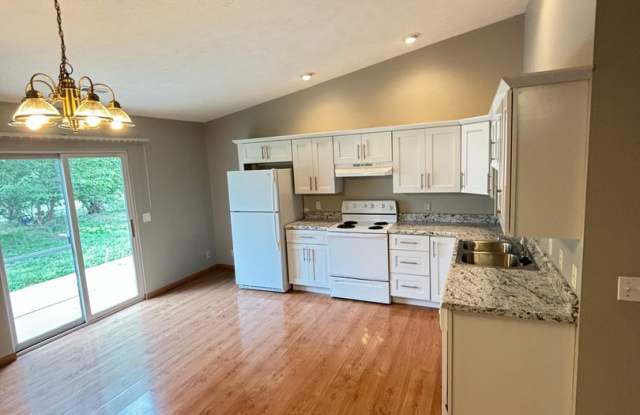 **$300 Off Move In Special** Spacious 3 Bedroom Townhome with Vaulted Ceilings, Fireplace  Attached Garage photos photos