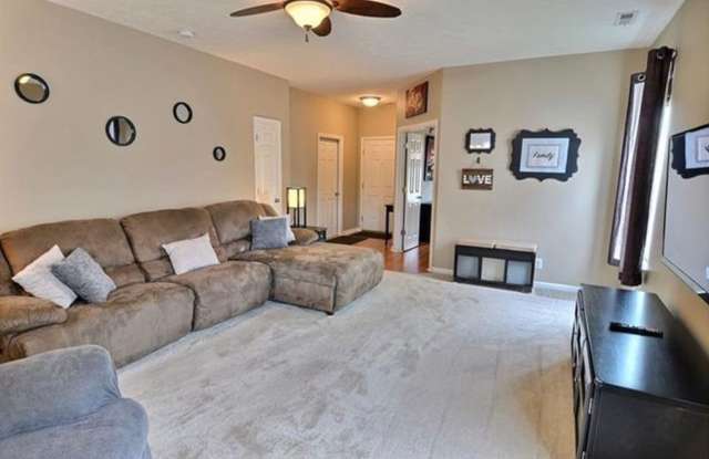 Ranch Style Home with Fence Backyard Gallery 4