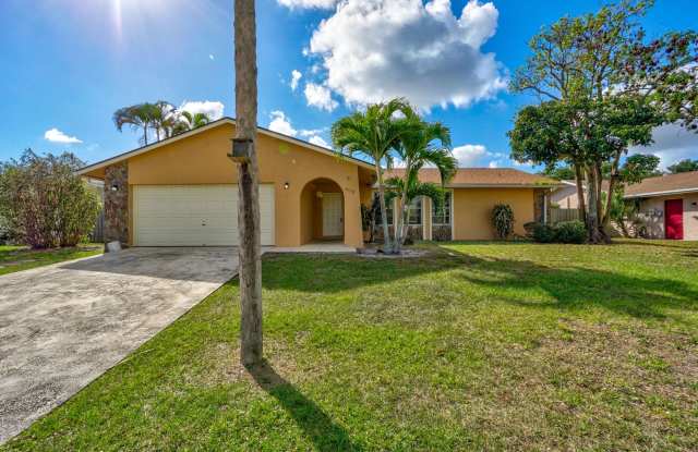 Welcome to this awesome 3-bedroom home with a 2-car garage and private pool located in the highly desirable Palm Beach Gardens area! photos photos