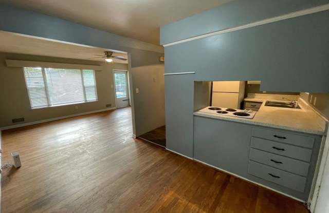 So much character with this 2 bed / 1.5 bath DUPLEX unit with a spacious layout and convenient features! Gallery 4