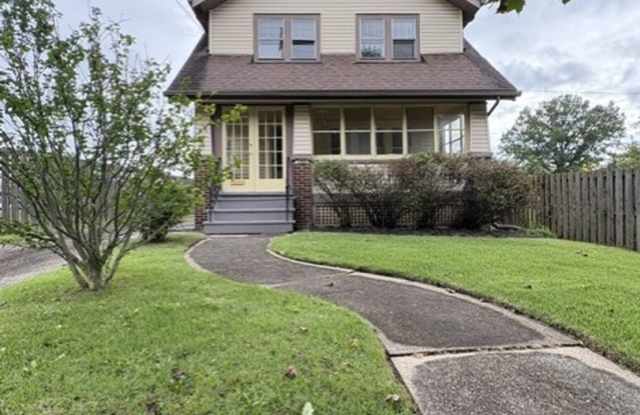 Beautiful 3BR/1.5BA Akron Home | Updated Kitchen | Garage | Enclosed Porch Gallery 1