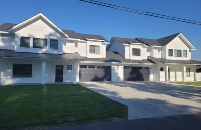 Brand New 4 Bed 3 Bath Modern Farmhouse Style Duplex in Mead with over 1850 Sq. Ft. on Huge Lot. photos photos
