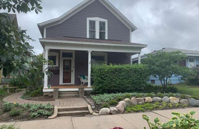 Charming 2 BR / 1.5 BA Duplex w/ Fireplace, Beautiful 2nd Level Deck, & Hardwood Floors! Available 7/15 photos photos