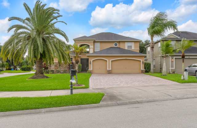 For Rent: Luxurious 4 Bed/3.5 Bath Home with Great Curb Appeal in Oviedo! - 3912 Heirloom Rose Place, Oviedo, FL 32766