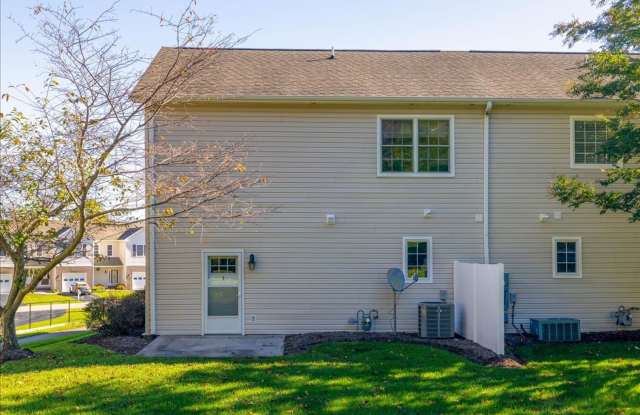 End-Unit Townhome with Open Backyard in The Orchards Gallery 3