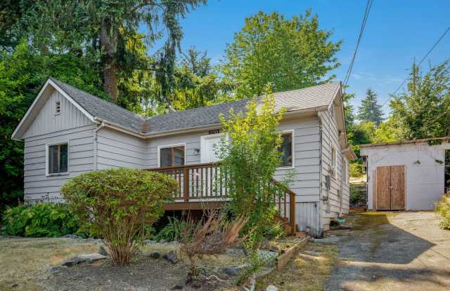 Charming 1 BD 1 BA cottage nestled on a beautifully landscaped lot photos photos