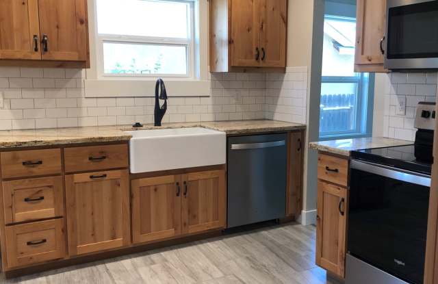 Beautiful Remodeled Home with Huge Bonus Space and Private Fenced Backyard! photos photos