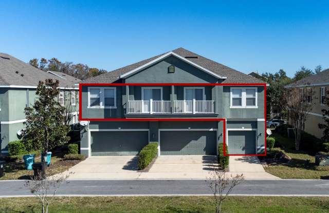 Beautiful second-floor, 2-bedroom, 2-bath condo with peaceful lake views and an attached 1-car garage Gallery 3