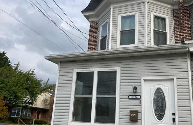 Fully renovated 3 bedroom, 2.5 bathroom end unit townhome with finished basement photos photos