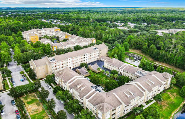 TOP Floor Artisan Park Condo in Celebration with 2 bedrooms, 2 bathroom, 1 Car Garage in a Elevator Building. - 1231 Wright Circle, Celebration, FL 34747