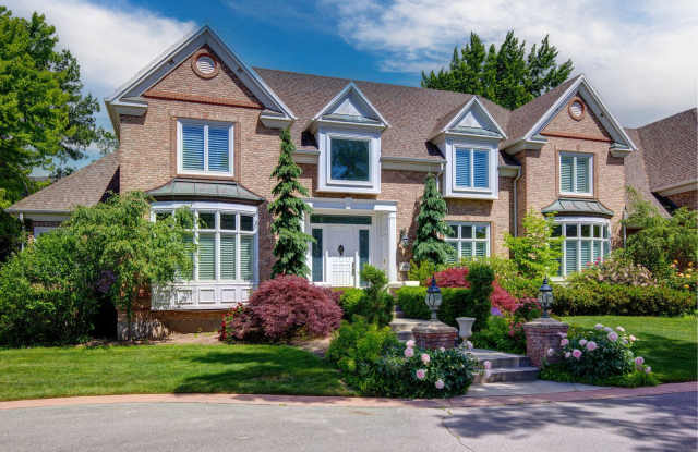 Luxurious 7-Bedroom Estate at 6395 Braxton Ct Gallery 1