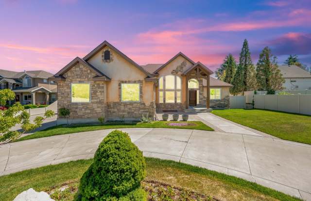 Elegant 5-Bedroom Home with 4-Car Garage and Park Access in Desirable Riverton Location photos photos