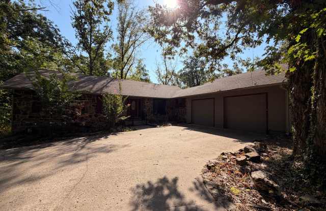 1/2 OFF FIRST MONTHS RENT! Spacious 4-Bedroom Home in Rogers, AR! photos photos