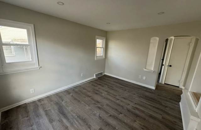 2 bed 1 bath recently refinished corner home with new kitchen, bathroom, and floors! photos photos