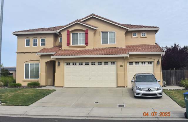 Gorgeous Four Bedroom Home with Three Car Garage/ Granite Counters/ New Paint and Flooring photos photos