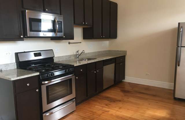 4956 N St Louis Ave photos photos