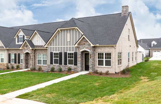 **BE THE LUCKY ONE TO LIVE IN THIS 2022-BUILT UPSCALE COTTAGE HOME IN THE PRESERVE AT BELLE POINTE** photos photos