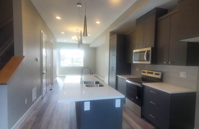 Beautiful and Updated 2BR Townhome With Attached Garage Available in September! Great Location! photos photos
