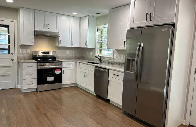 JUST LIKE NEW!  Landlord just finishing up doing a total remodel on this 3 bedroom/2 bath home with large outbuilding. Gallery 3
