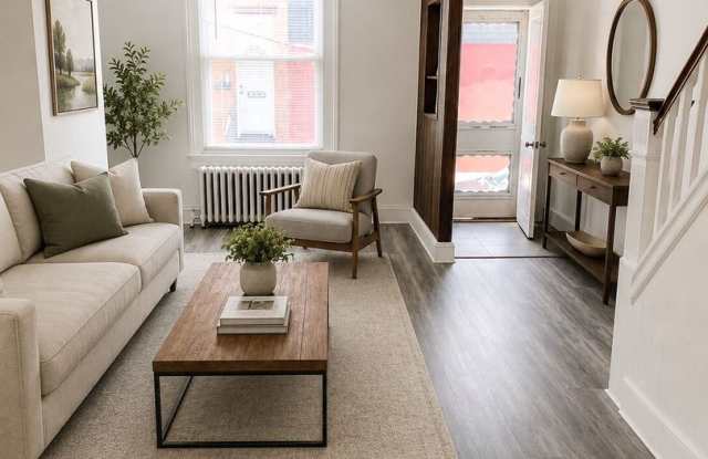 Bright 2BR Port Richmond Row Home with Large Living Space & Basement Storage photos photos