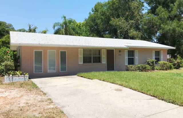 Unique Find! HUGE detached garage/workshop, 3 bedroom, 1 1/2 bath home, screened porch - 4330 Grand Avenue, Volusia County, FL 32720