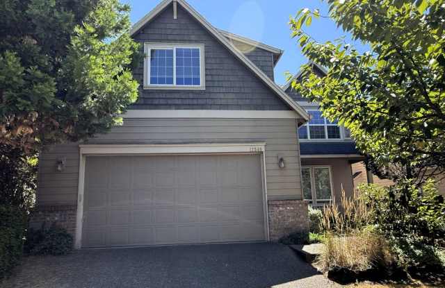 12540 NW Brimpton Court ~ Elegant Bethany Home with NEW Carpet & Fresh Paint Gallery 1