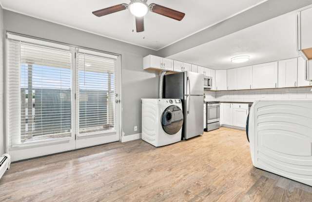 Beautifully Renovated 3 Bedroom Apartment with Private Balcony, In-Unit Laundry & A/C Gallery 2