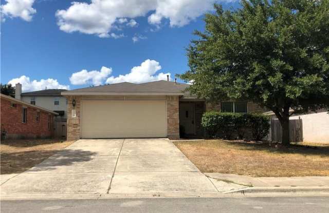 126 Salado Dr in Kyle is a charming single-story brick home nestled in the Silverado at Plum Creek community! photos photos