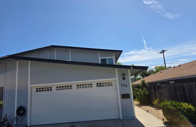 Large 4 bedroom 2 bath home with downstairs bedroom and attached garage photos photos