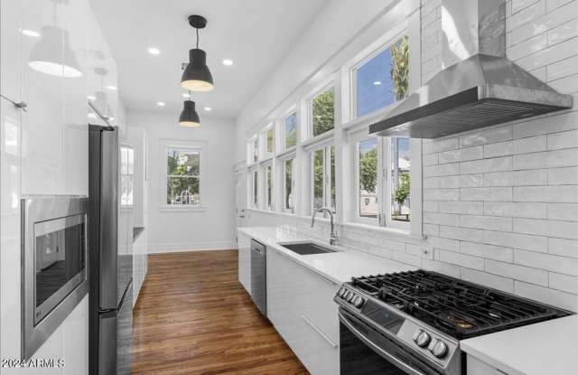 Roosevelt Row historic and updated home close to everything downtown! Truly unique!!!  Absolute stunner that is an Oasis in the City!!!  Everything redone!!  True Charmer!!! photos photos