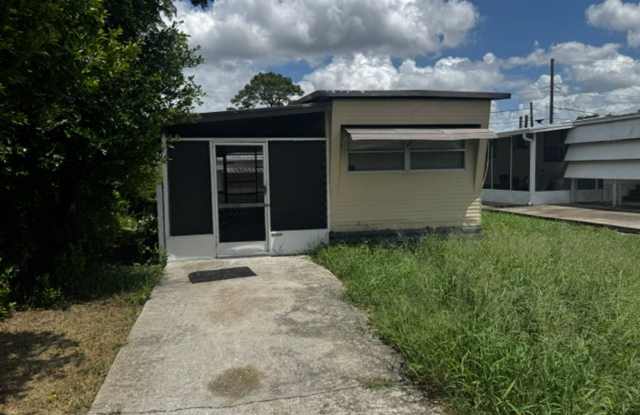Recently Updated 1BR Home in Port Richey | Fresh Paint, New Flooring & Move-In Ready! photos photos