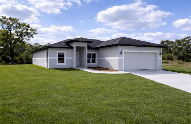 MODERN BRAND NEW 4BD/2BA RETREAT IN LEHIGH ACRES! photos photos