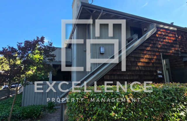 1/1 Condo with Vaulted Ceilings, Community Pool, Parking, Fireplace and Updated Throughout! photos photos