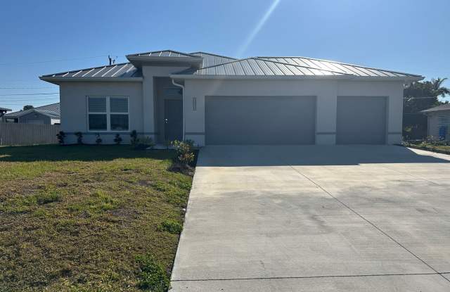 AVAILABLE MID APRIL- 4 Bedroom 2 bathroom 3 Car Garage NE Cape Coral Home with Screened Lania photos photos