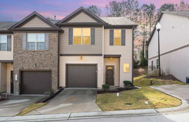 Welcome home! This pristine, end-unit townhome combines modern comfort, thoughtful upgrades, and low-maintenance living in an unbeatable Holly Springs location. Gallery 1
