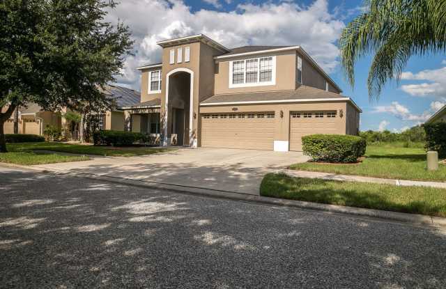 Elegant 5‑Bedroom Pool Home with 3‑Car Garage in Easton Park, New Tampa! photos photos