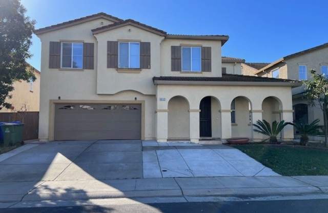 Spacious home featuring nearly 3,100 square feet of living space. Close to schools, parks and shopping. photos photos