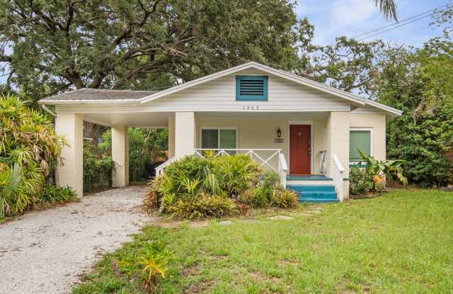 Spacious 2-Bedroom Home with Front Porch, Carport, Large Fenced Yard  Fire Pit photos photos