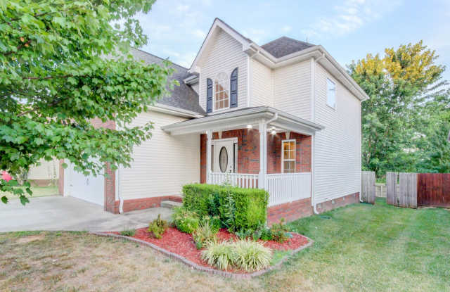 Stunning Brick Front Home With Fireplace And Hardwood Flooring In Fields of Northmeade photos photos