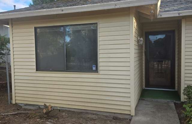 Centrally located 2 BR, 2 BA Duplex Unit with 1-car garage Gallery 1