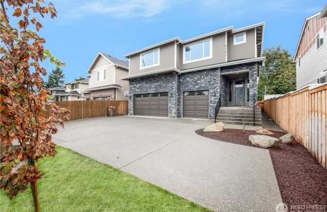 Luxury NW Living: 4 Bedroom Masterpiece with Dual Suites and Private Yard in Desirable Browns Point! photos photos