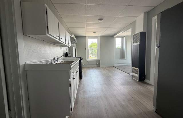Historic Charm. Modern Comfort: Bright Spaces • Updated Finishes • Walkable Location Gallery 3