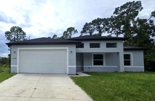 Large 4 Bed 3 Bath with 2 Car Garage-LEHIGH ACRES photos photos