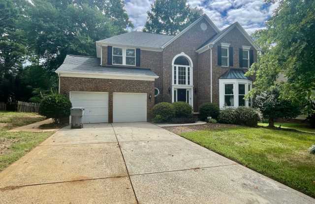 This spacious 4-bedroom, 2.5-bathroom residence offers the perfect blend of comfort and luxury - 8709 Londonshire Drive, Charlotte, NC 28216