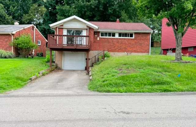Newly remodeled 3-bedroom, 1.5-bath home featuring granite countertops, central A/C, and a partially finished basement. photos photos