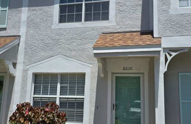 SPECIAL PRICE REDUCTION!-  Immaculate 2-Bedroom, 2.5-Bath Townhome in Gated Hunter’s Key Gallery 4