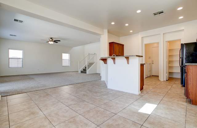 4 Bedroom in Tolleson.  Landscaping redone.  Brand NEW AC THIS WEEK, Available August 1st!!!  Great 2 story with great storage and well laid out!!! Gallery 1