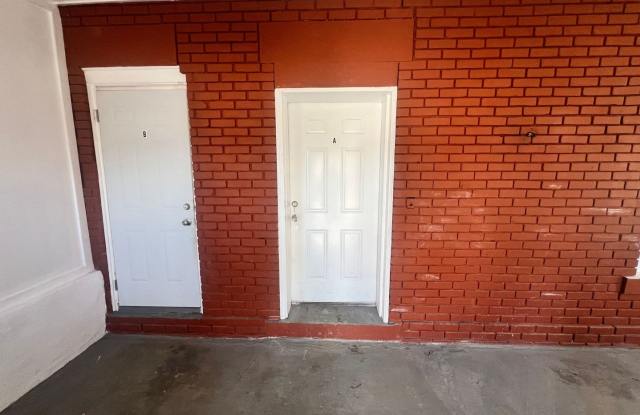 Stylish 2-Bedroom Unit Featuring Decorative Fireplace Gallery 3