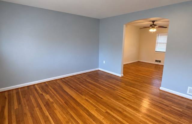 Charming 3-Bedroom Home with Hardwood Floors & Covered Parking Gallery 3