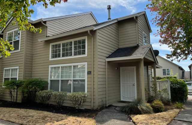 Beautiful and Well Maintained 2 Bed and 2.5 Bath Townhome! Vaulted Ceilings! Tons of storage! Low Maintenance Lawn Care! photos photos
